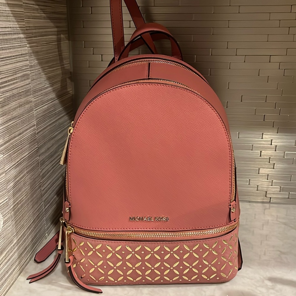 Micheal Kors dark pink back pack